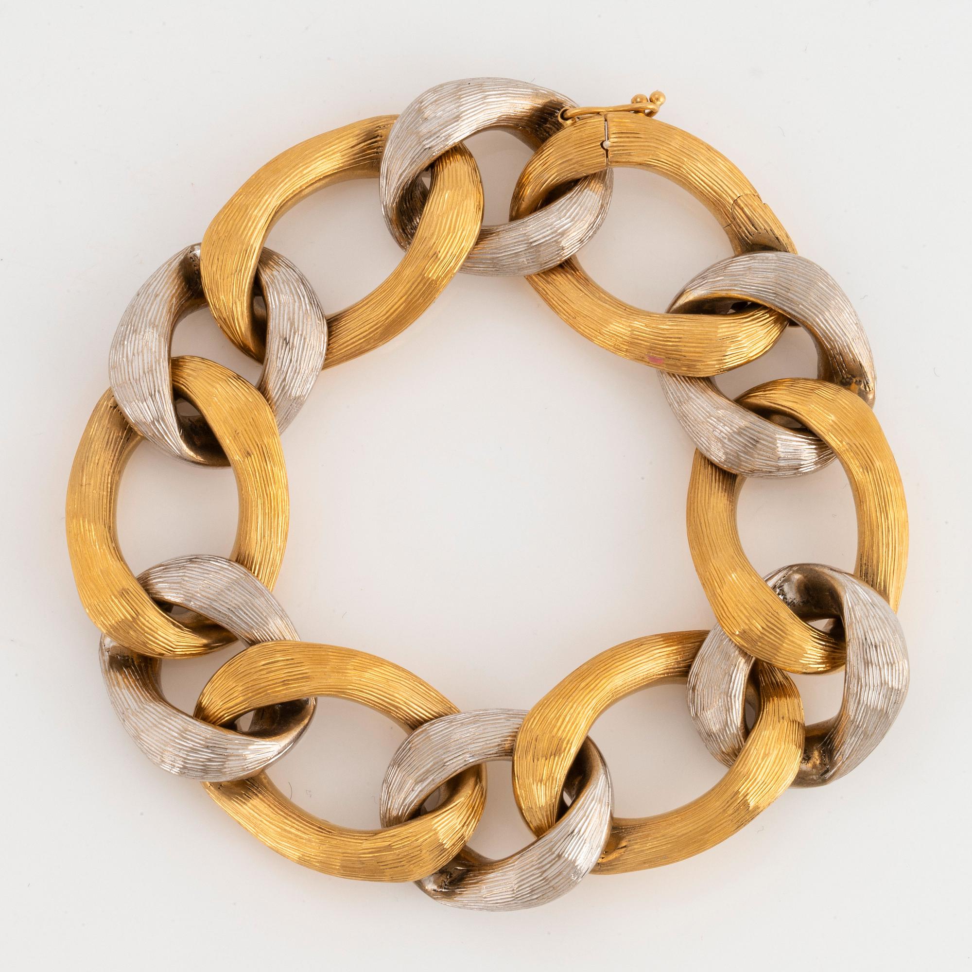 Bucherer armband 18K guld och vitguld.