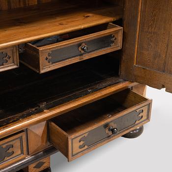 An oak Baroque cabinet, 18th Century.