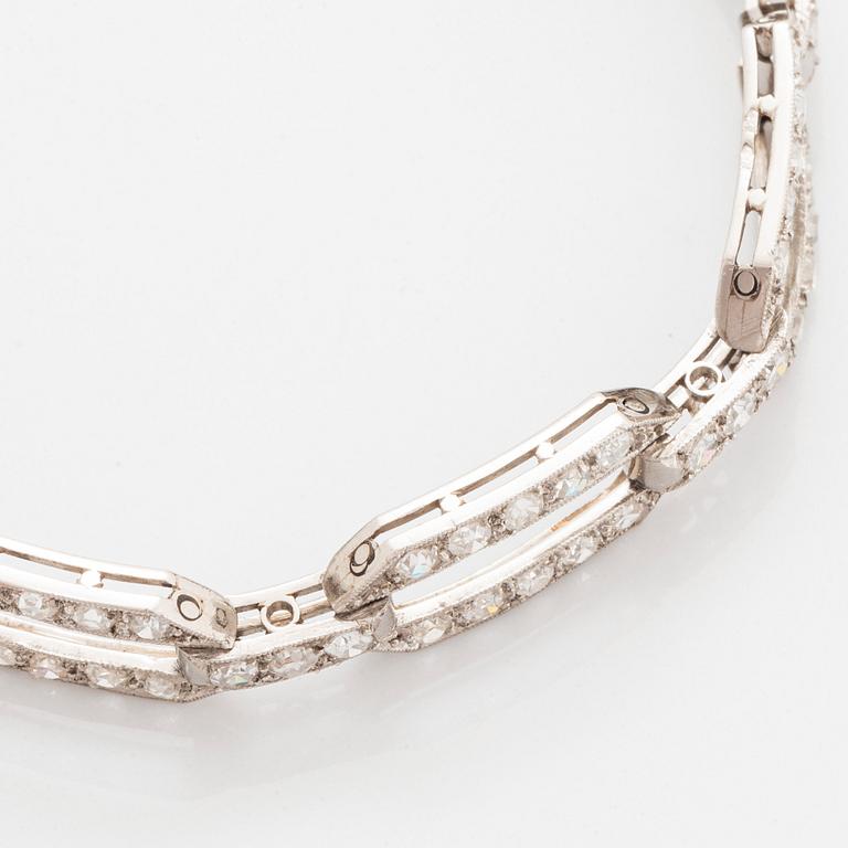 A platinum bracelet set with old-cut diamonds.