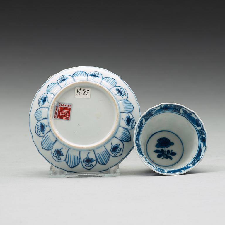 A set of nine blue and white cups with stands, Qing dynasty, Kangxi (1662-1722).