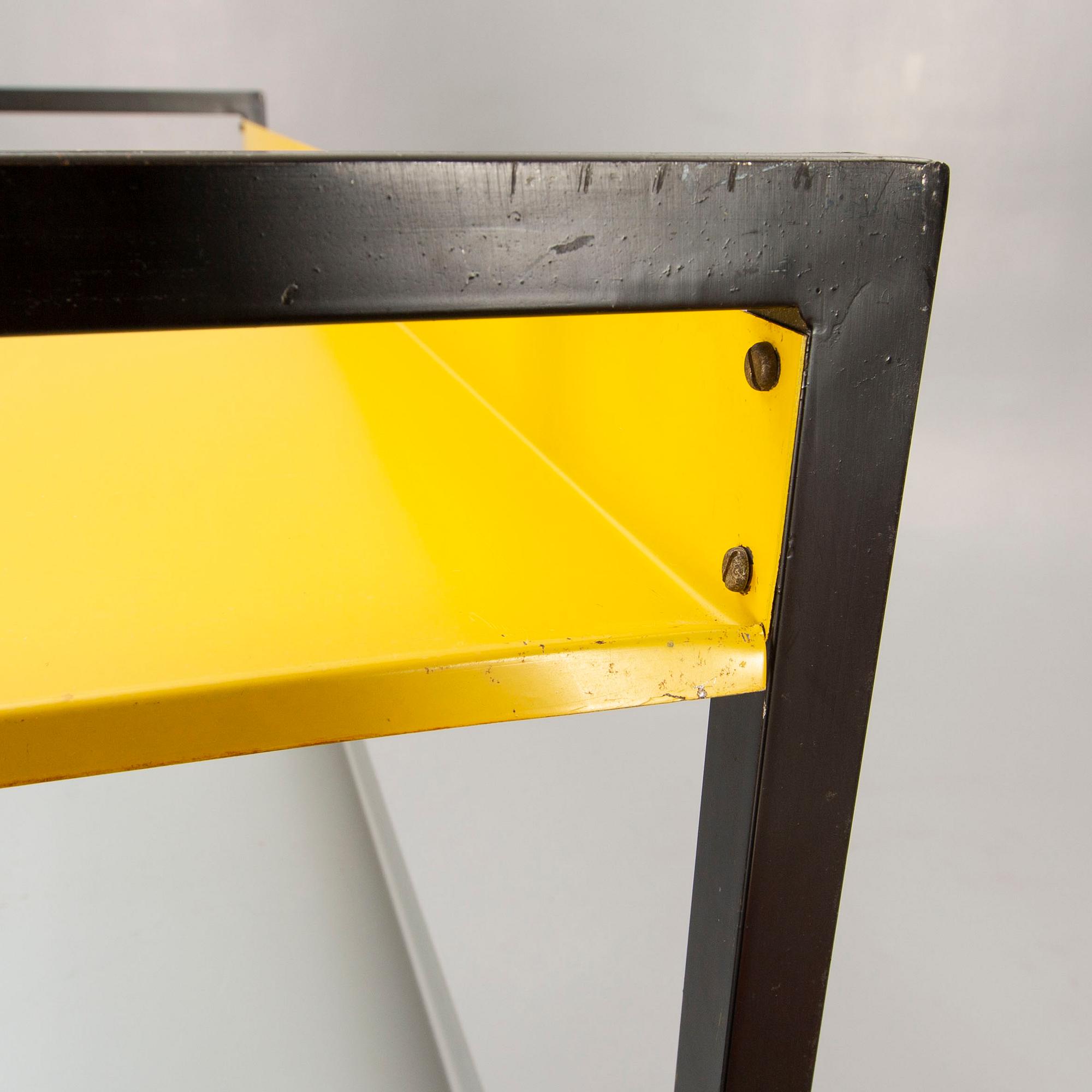 A pair of 1950s Adriaan Dekker lacquered metal book shelves for Tomado Holland.