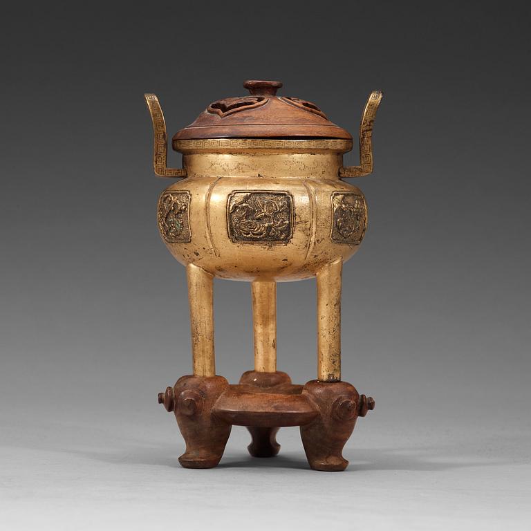 A bronze tripod censer, Qing dynasty, 19th Century.