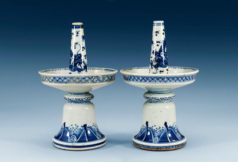 A pair of blue and white candlesticks, Qing dynasty, 18th Century. (2).