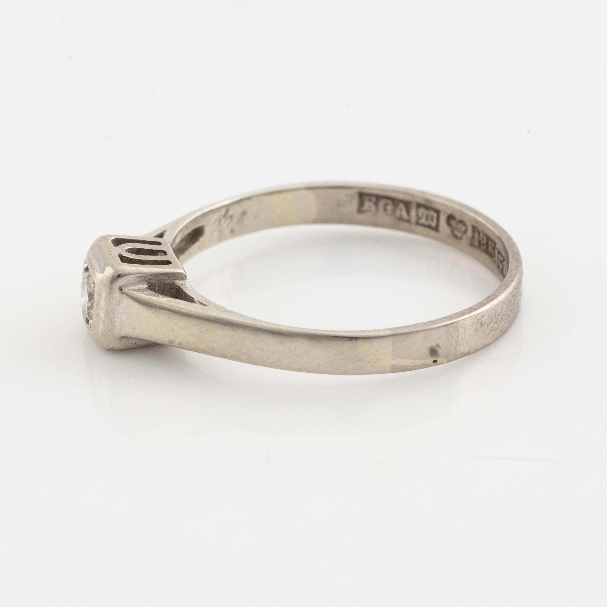 White gold and brilliant cut diamond ring.