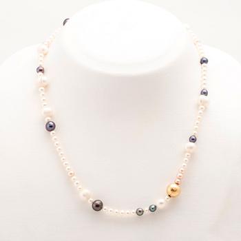 Ole Lynggaard, two cultured pearls necklaces and a bracelet with 18K gold clasp.