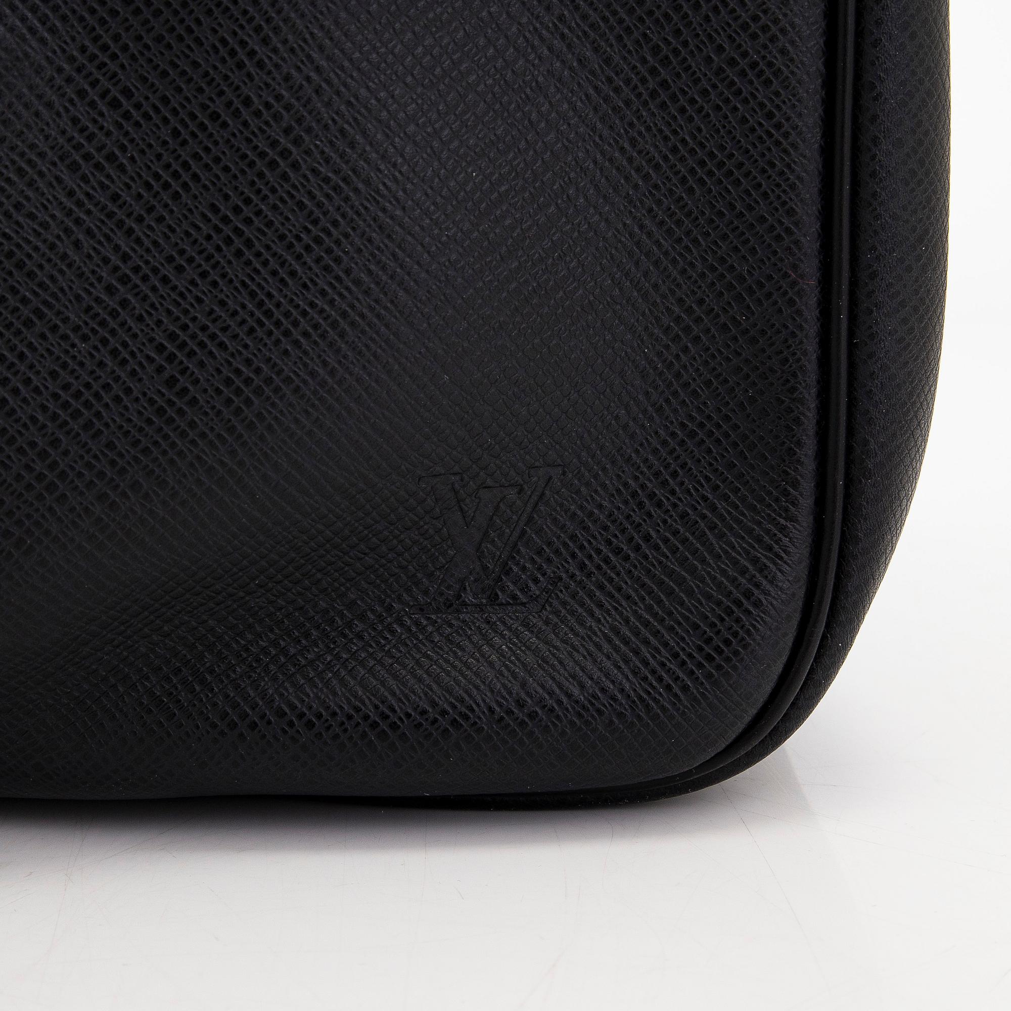 Louis Vuitton, a 'Taiga Kendall PM' weekend bag.