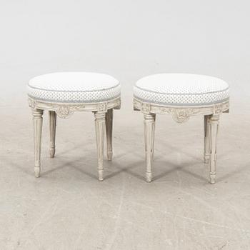 A pair of late Gustavian stools, first half of the 19th century.