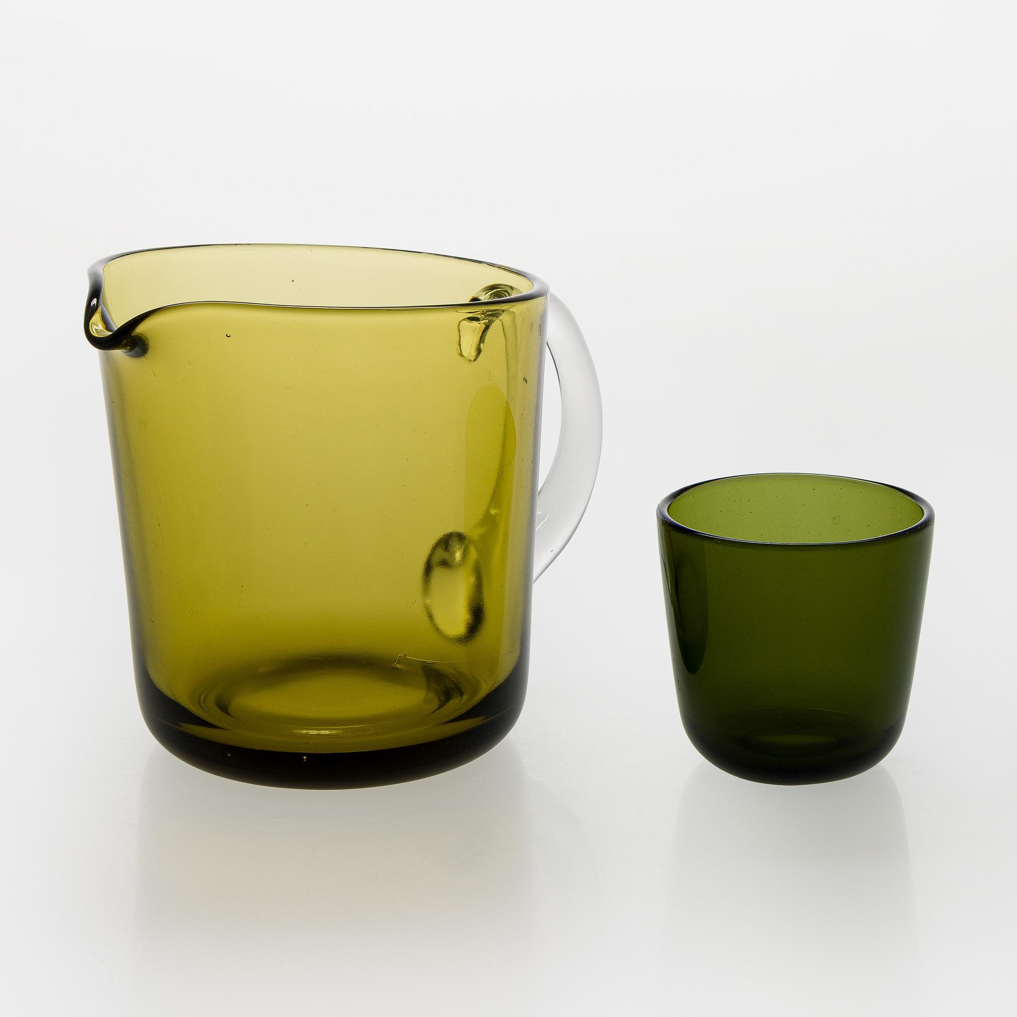 Kaj Franck, a mid-20th century "5601" glass pitcher and a twelve "5023" glasses, Nuutajärvi, Finland.