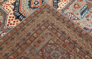 An Oriental carpet, c. 296 x 249 cm.