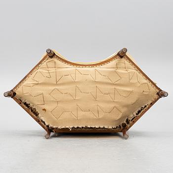 An Empire-style sofa, around 1900.