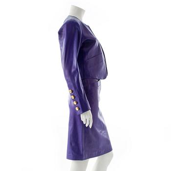 YVES SAINT LAURENT, a purple leather two-piece dress consisting of jacket and skirt.