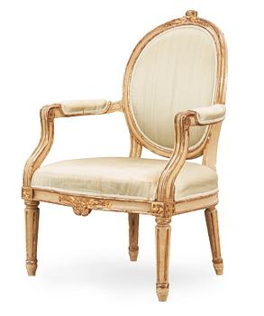 1534. A Gustavian late 18th century armchair.