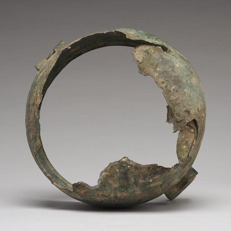 A bronze tripod food vessel and cover, "Ding", Eastern Zhou Dynasty.