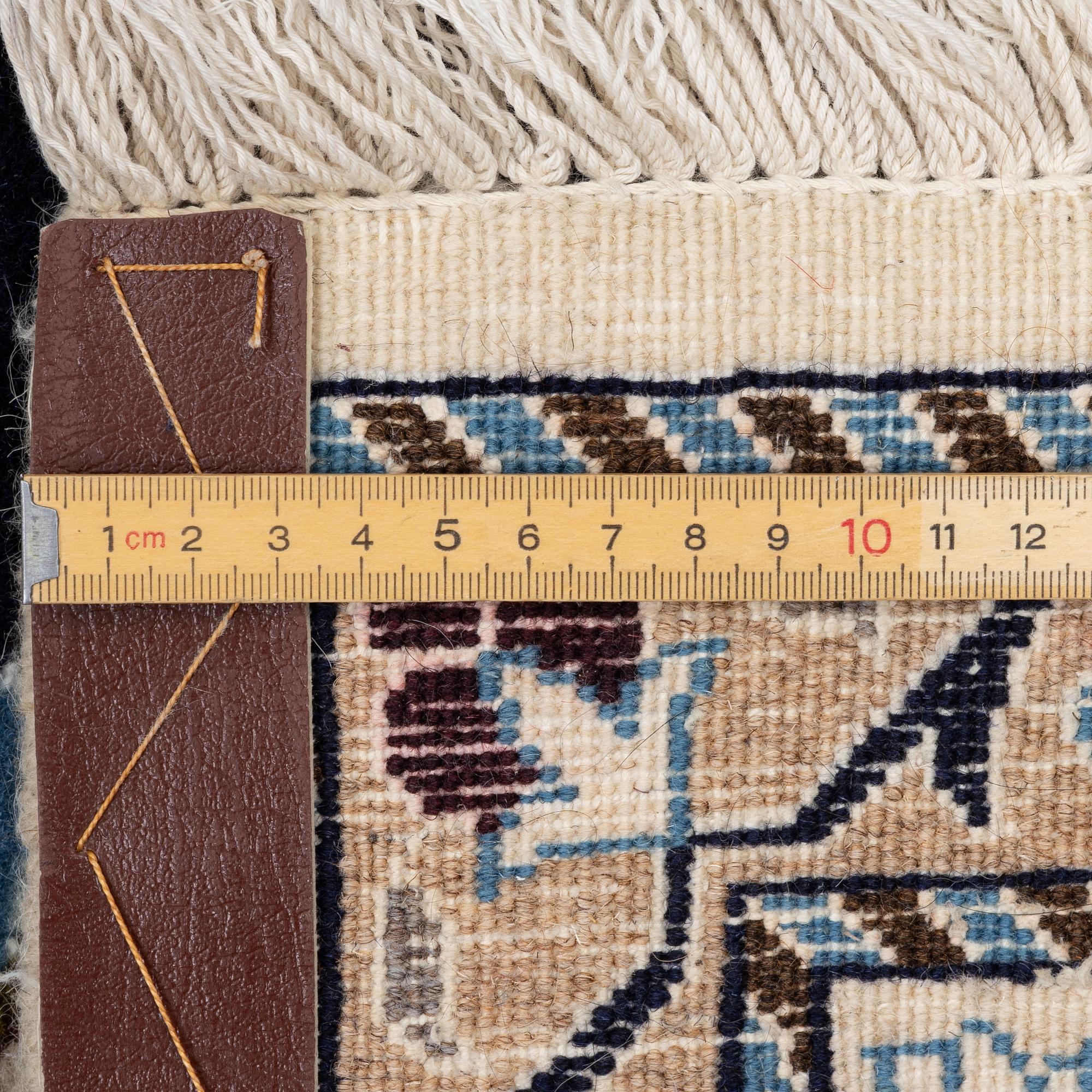 A Nain carpet, Central Persia, c. 300 x 195 cm.