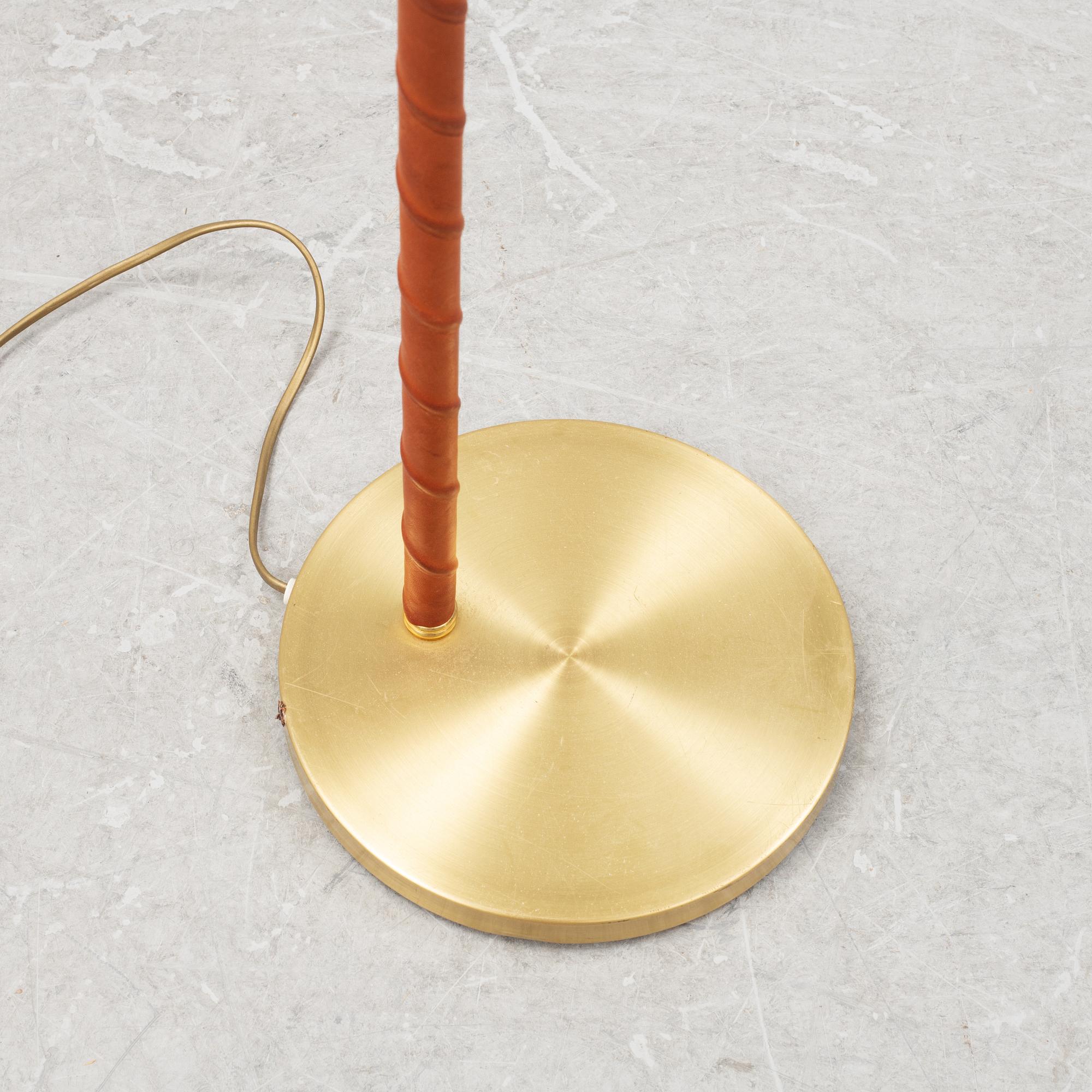 A brass floor lamp from EWÅ, second part of the 20th Century.