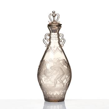 Simon Gate, an engraved glass decanter with stopper, Orrefors 1926, model 234.