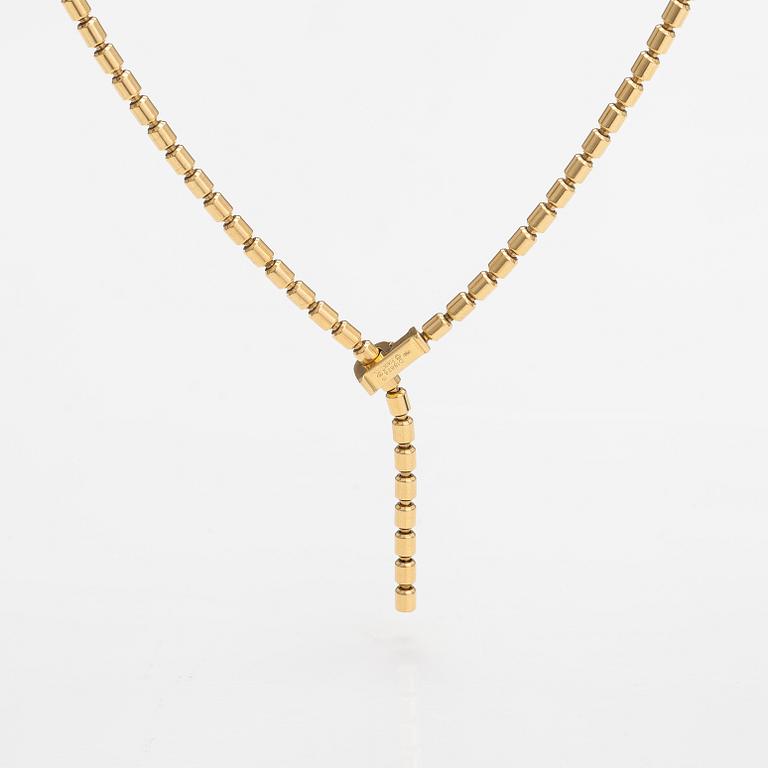 Piaget, An 18K gold "Possession" necklace with diamonds ca. 0.17 ct in total. Marked Piaget D18828.