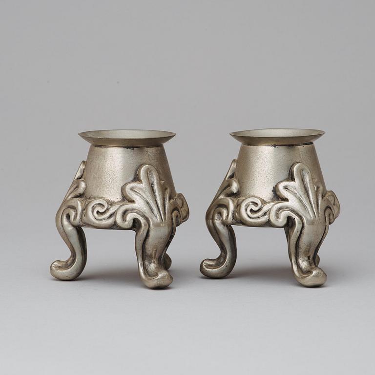 A pair of Svenskt Tenn pewter candlesticks, Stockholm 1928.