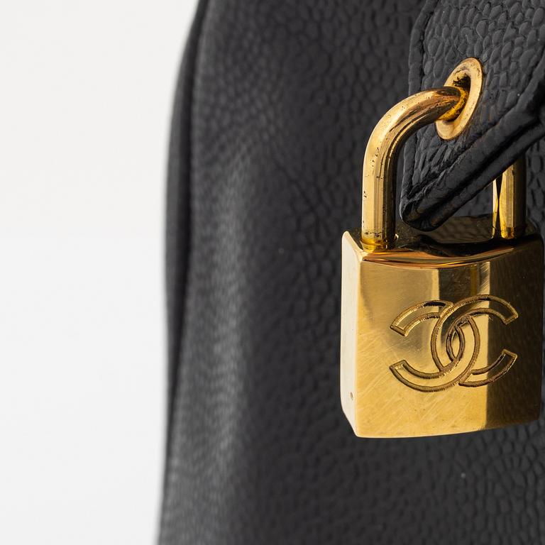 Chanel, a black caviar leather 'Boston bag'.