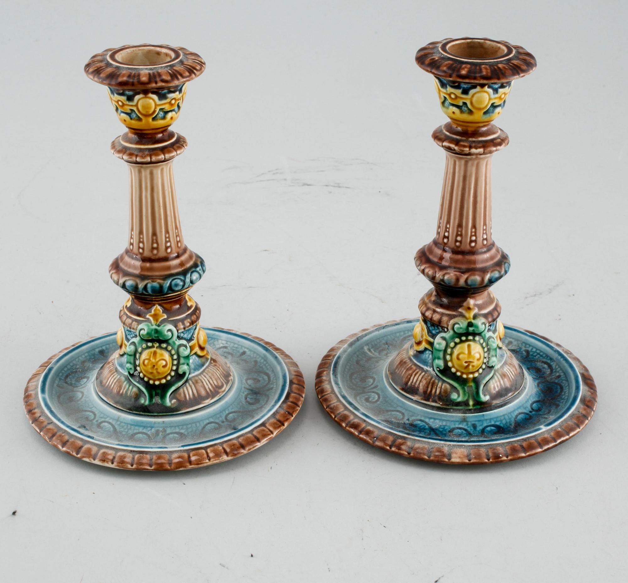 A pair of majolica candle holders from Rörstrand, made in the second half of the 19th century.