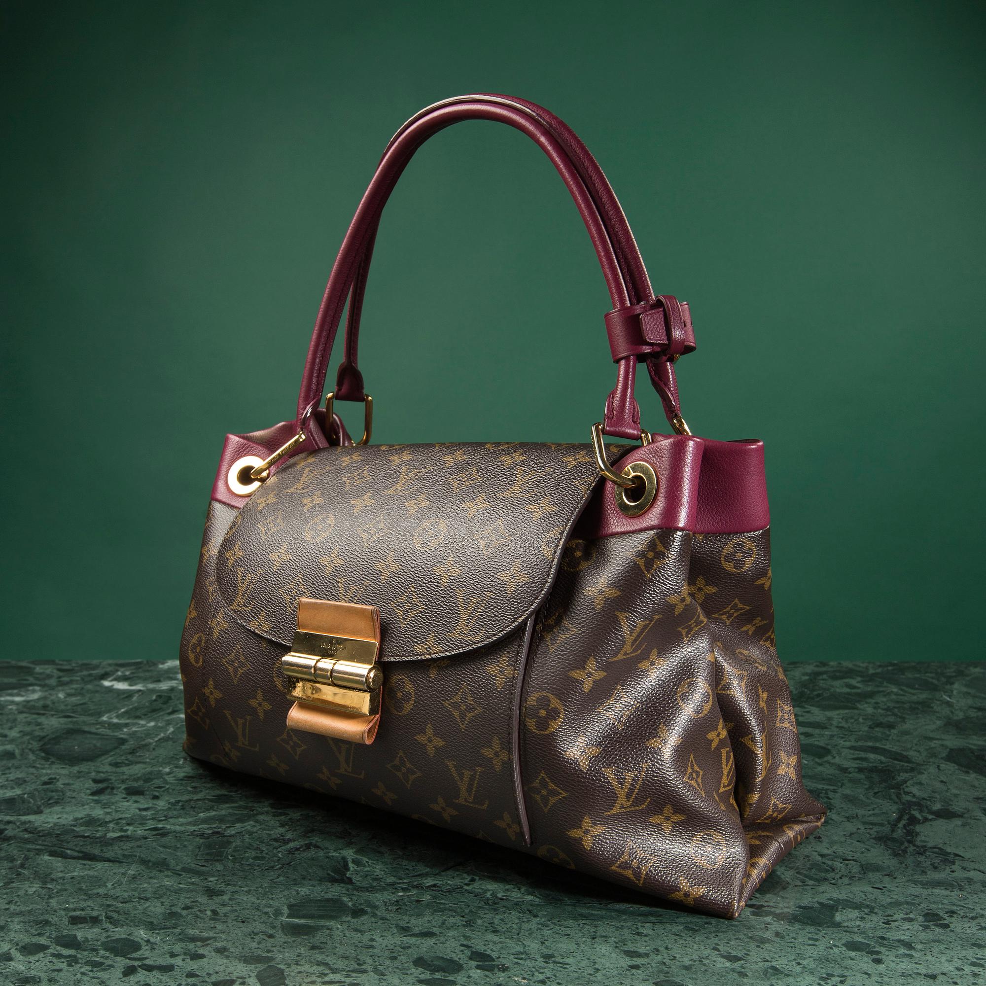 A bag, "Olympe Aurore" by LOUIS VUITTON.
