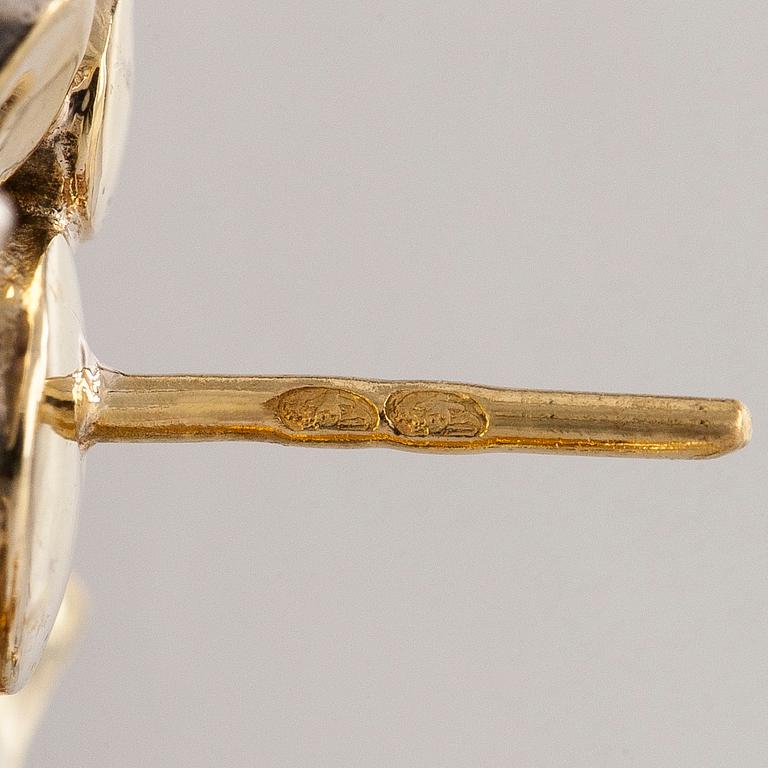 Korvakorut, 18K kultaa ja ruusuhiottuja timantteja.