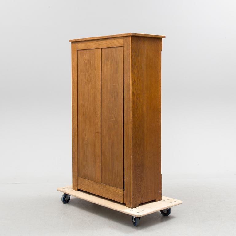 A German oak filing cabinet, first half of the 20th century.
