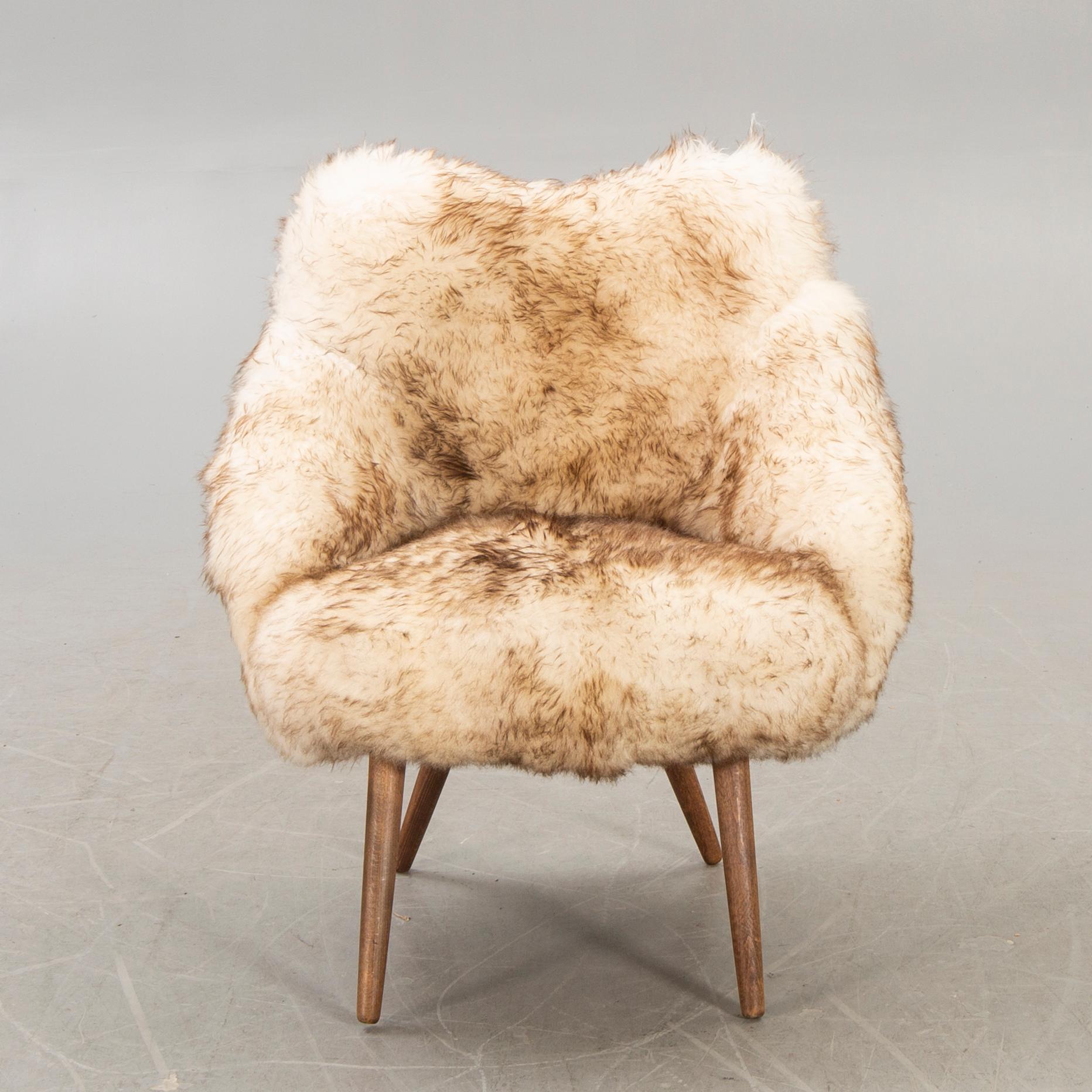 A 1950/60 sheepskin armchair.