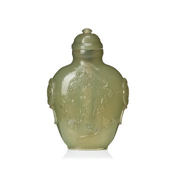 673. A Chinese carved nephrite snuff bottle with cover.