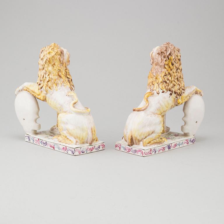 A PAIR OF FRENCH FAYENCE BOOK ENDS, 20th century.