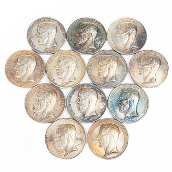 Twelve silver medals, Kungliga Myntverket, Sweden, early 20th century.