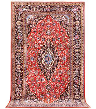 A Keshan, semi-antique carpet, c. 240 x 144 cm.