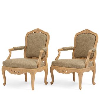 A pair of Swedish Rococo fauteuils à la reine, Stockholm, later part of the 18th century..