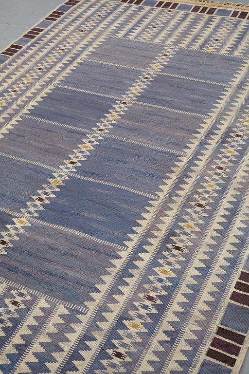 Barbro Nilsson, a carpet, "Salerno blå", flat weave, ca 312 x 201,5-205,5 cm, signed AB MMF BN.