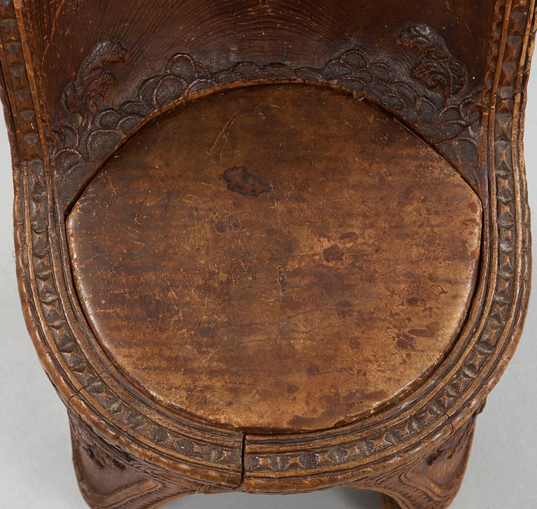 Knut Fjaestad, an Art Nouveau folk art sculptured pine chair, Sweden early 1900's.