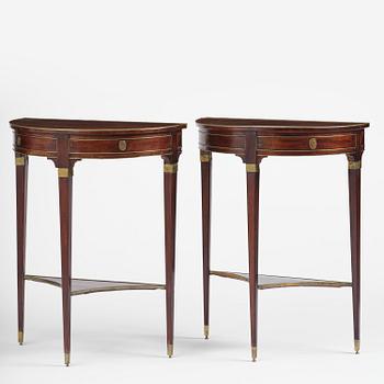 A pair of late Gustavian mahogany consoles in the manner of A. Lundelius, Stochkolm, late 18th century.