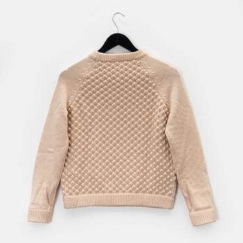 Chloé, a wool sweater, size S.