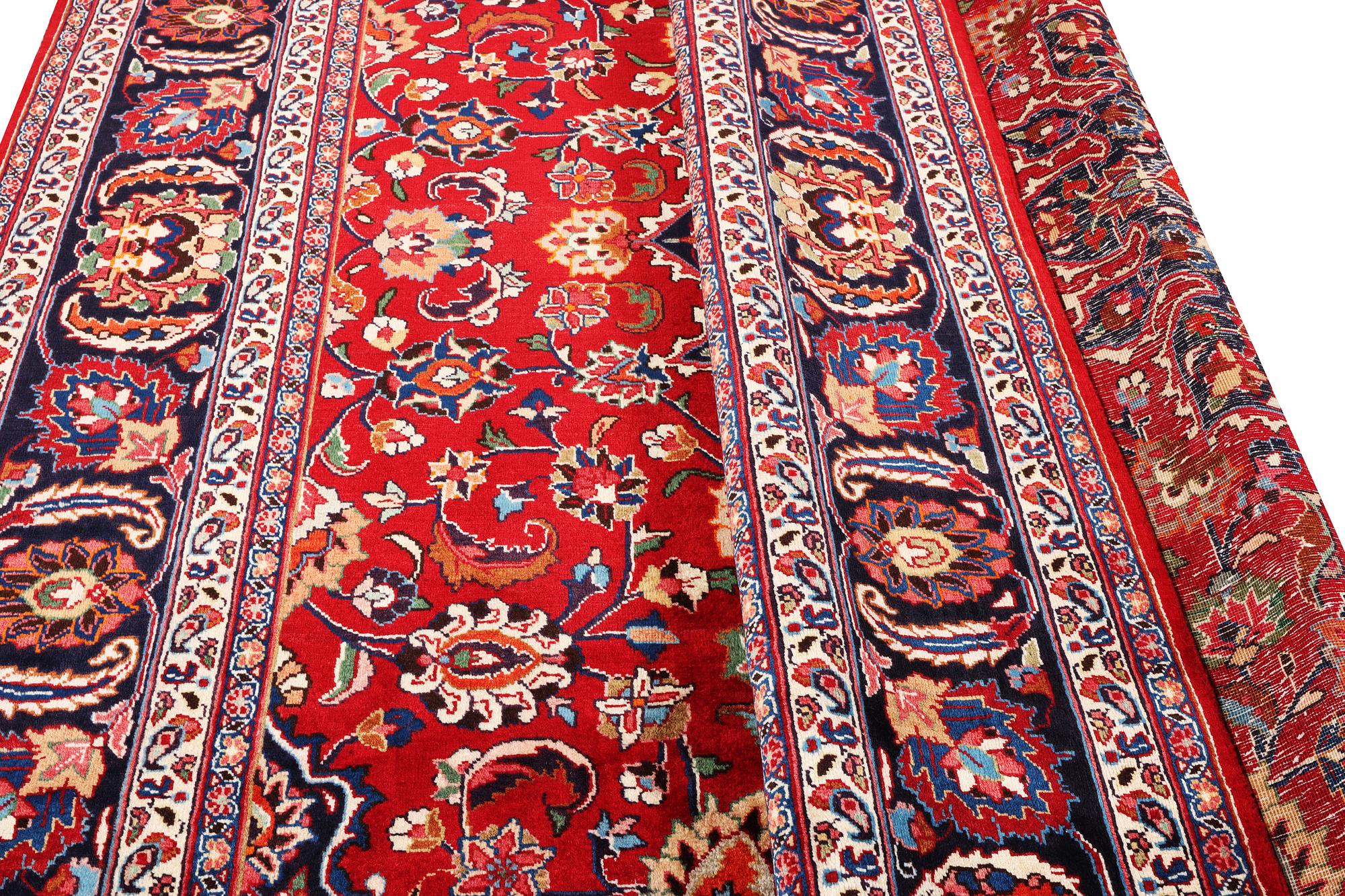 A Meshed carpet, c. 352 x 250 cm.