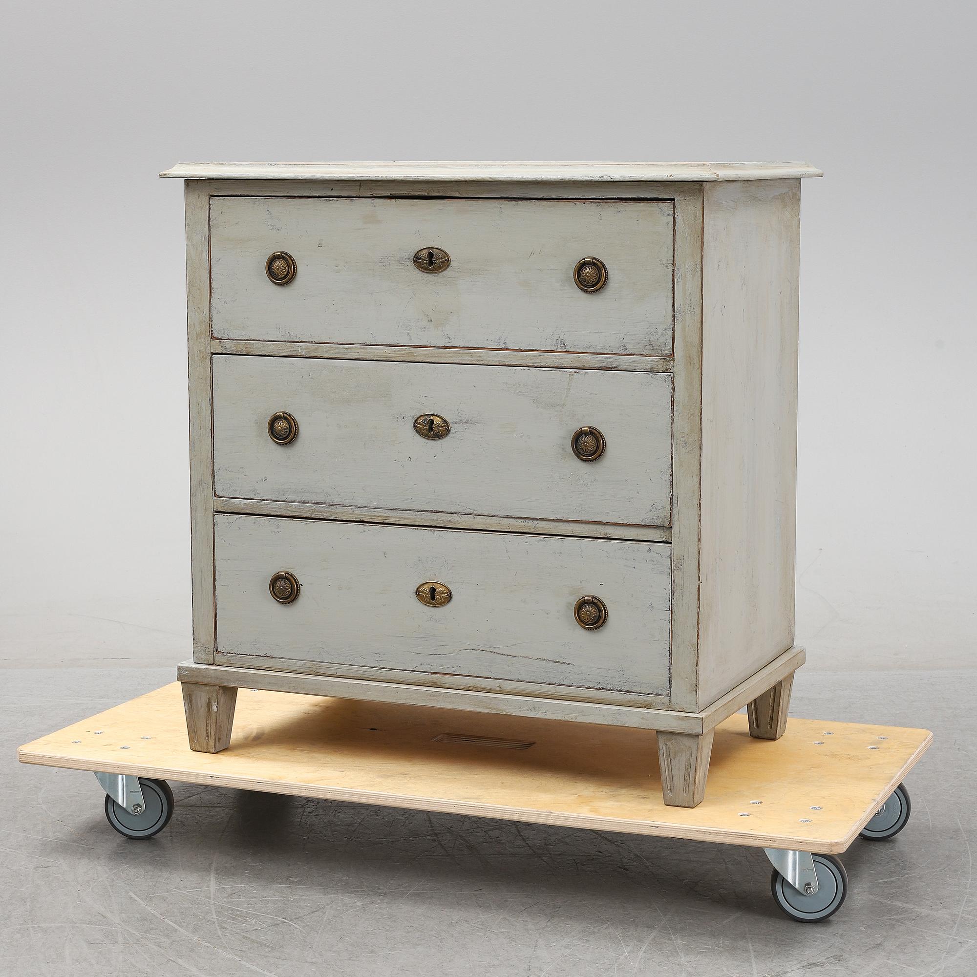 A Swedish painted chest of drawers, around the year 1900.