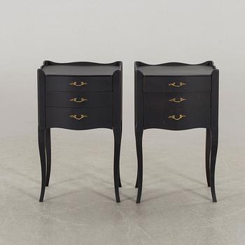 A pair of painted bedside tables, second half of the 20th Century.