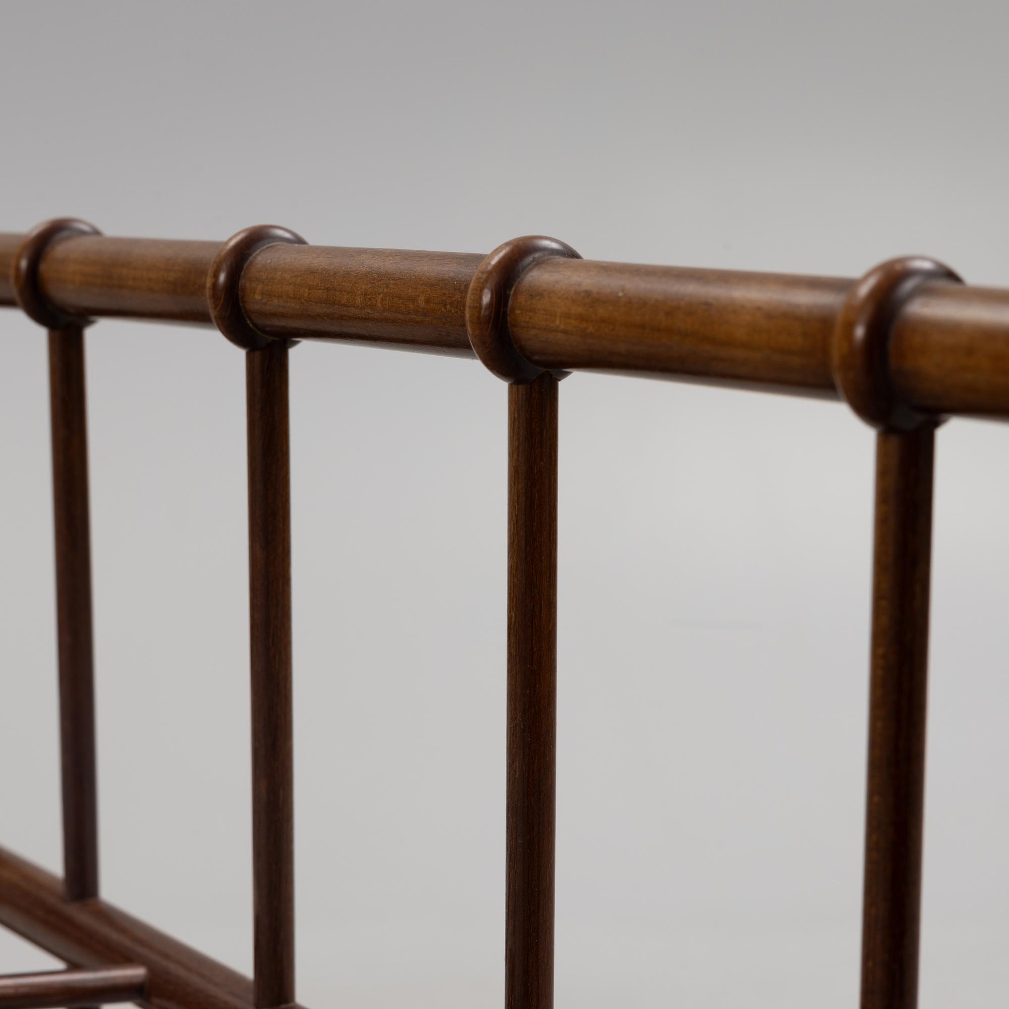 A magazine rack, mid-20th century.