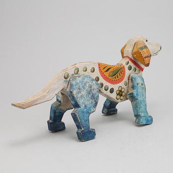 A Swedish painted wooden dog, 1940s.