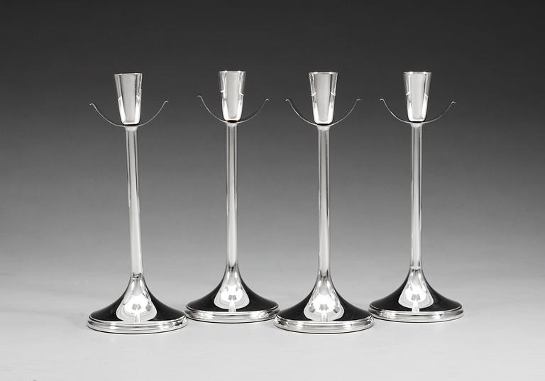 A set of four Vera Ferngren silver candlesticks by GAB, Stockholm 1967.