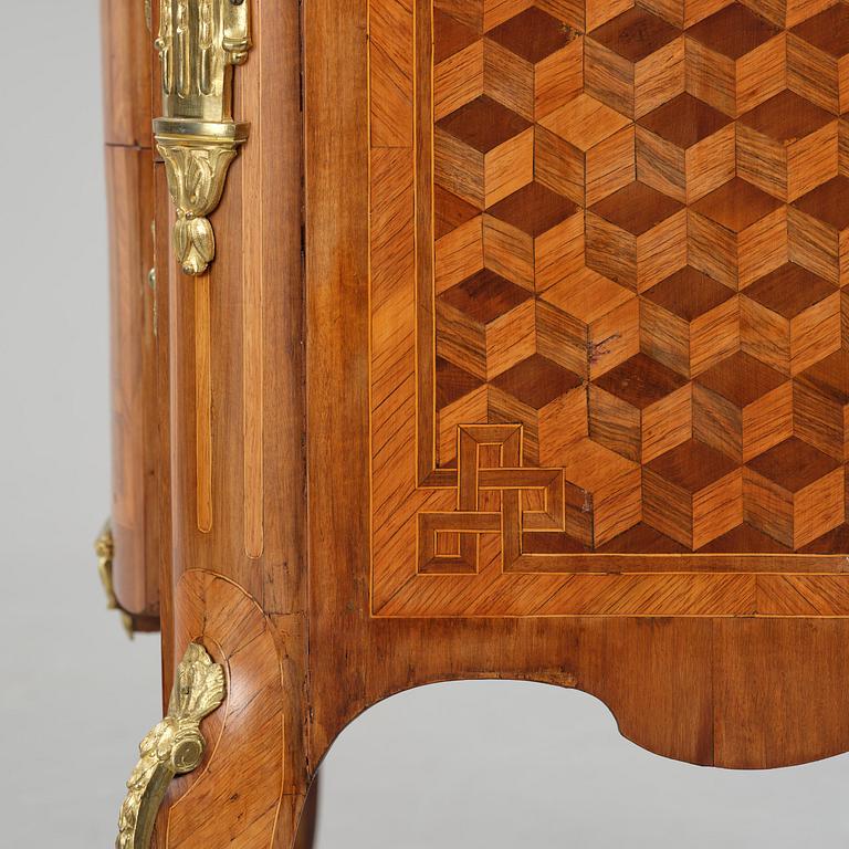 A Louis XVI rosewood and amaranth marquetry ormolu-mounted commode by Leonard Boudin (master in Paris 1761).
