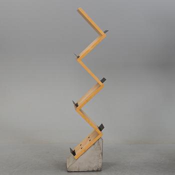 A "Zink" magazine rack, designed by Jonas Bohlin in 1984 for Källemo AB.