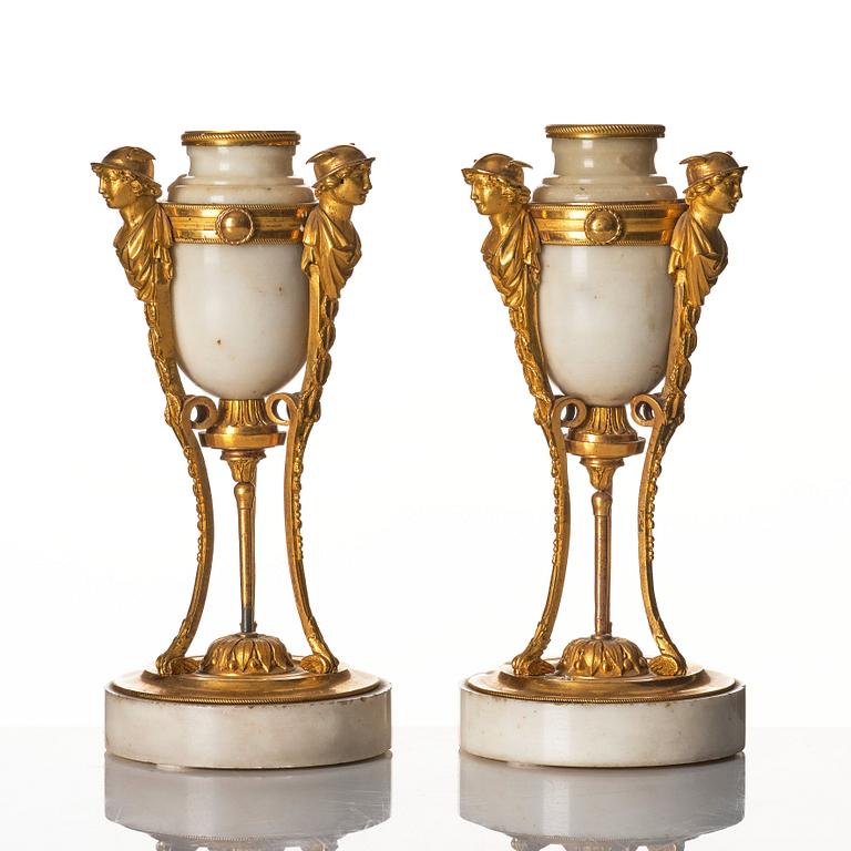 A pair of Louis XVI Cassolettes, white marble and gilt-bronze, around 1790.