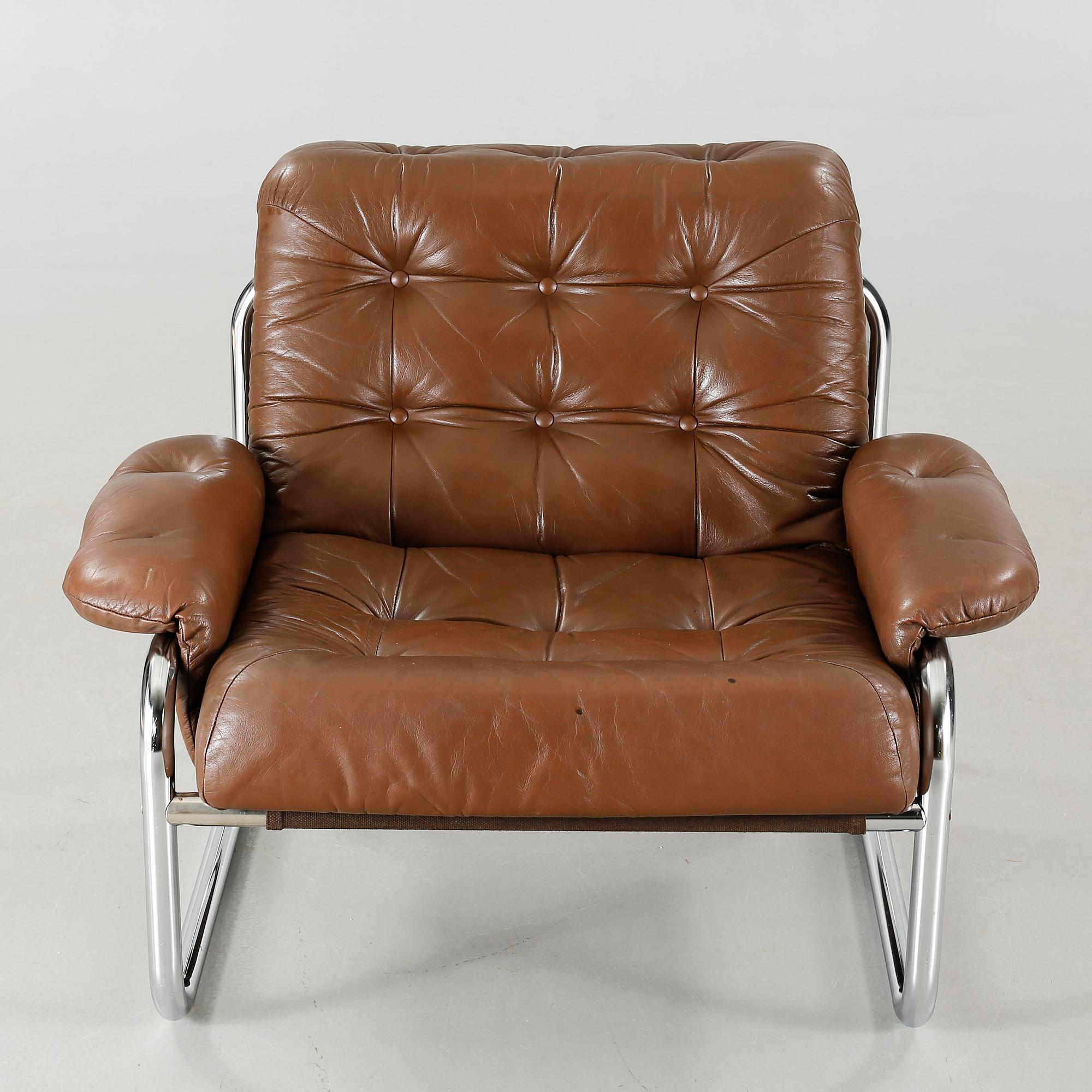 A 1970s sofa and armchair, deigned by John Bertil Häggström for IKEA.