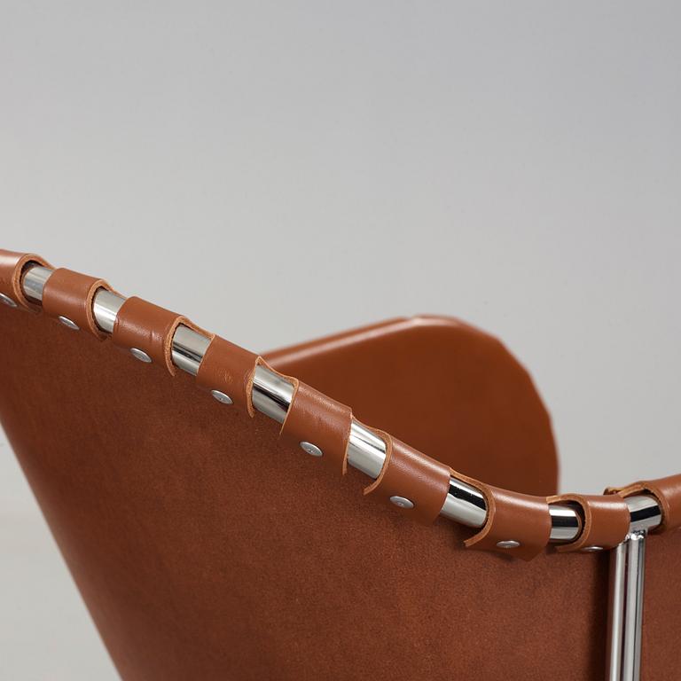 Mats Theselius, A pair of 'Bruno' brown leather and steel easy chairs, Källemo, Sweden.