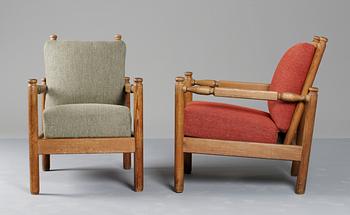 A pair of Axel-Einar Hjorth stained pine armchairs 'Sandhamn' by Nordiska Kompaniet ca 1929.