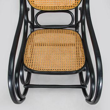 A mid-20th century Thonet style rocking chair.